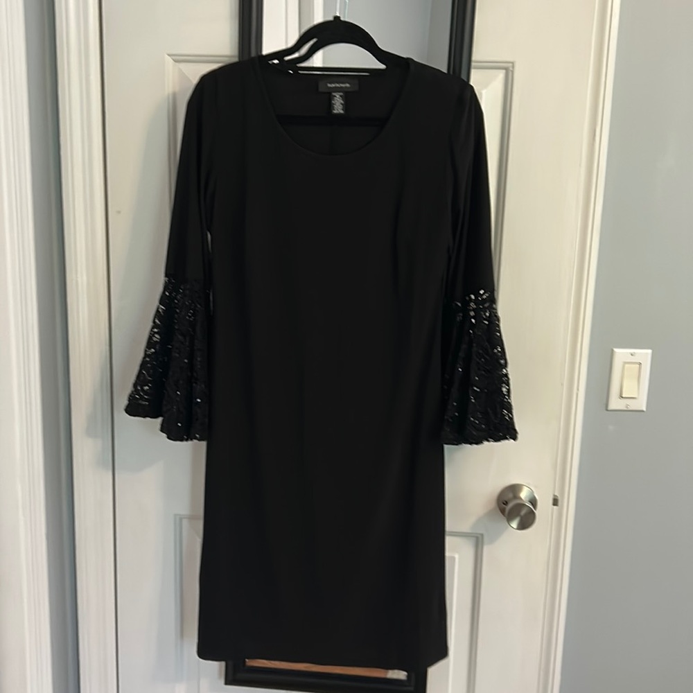 Black microfiber knit dress. Lace sequin flance sleeve size 10